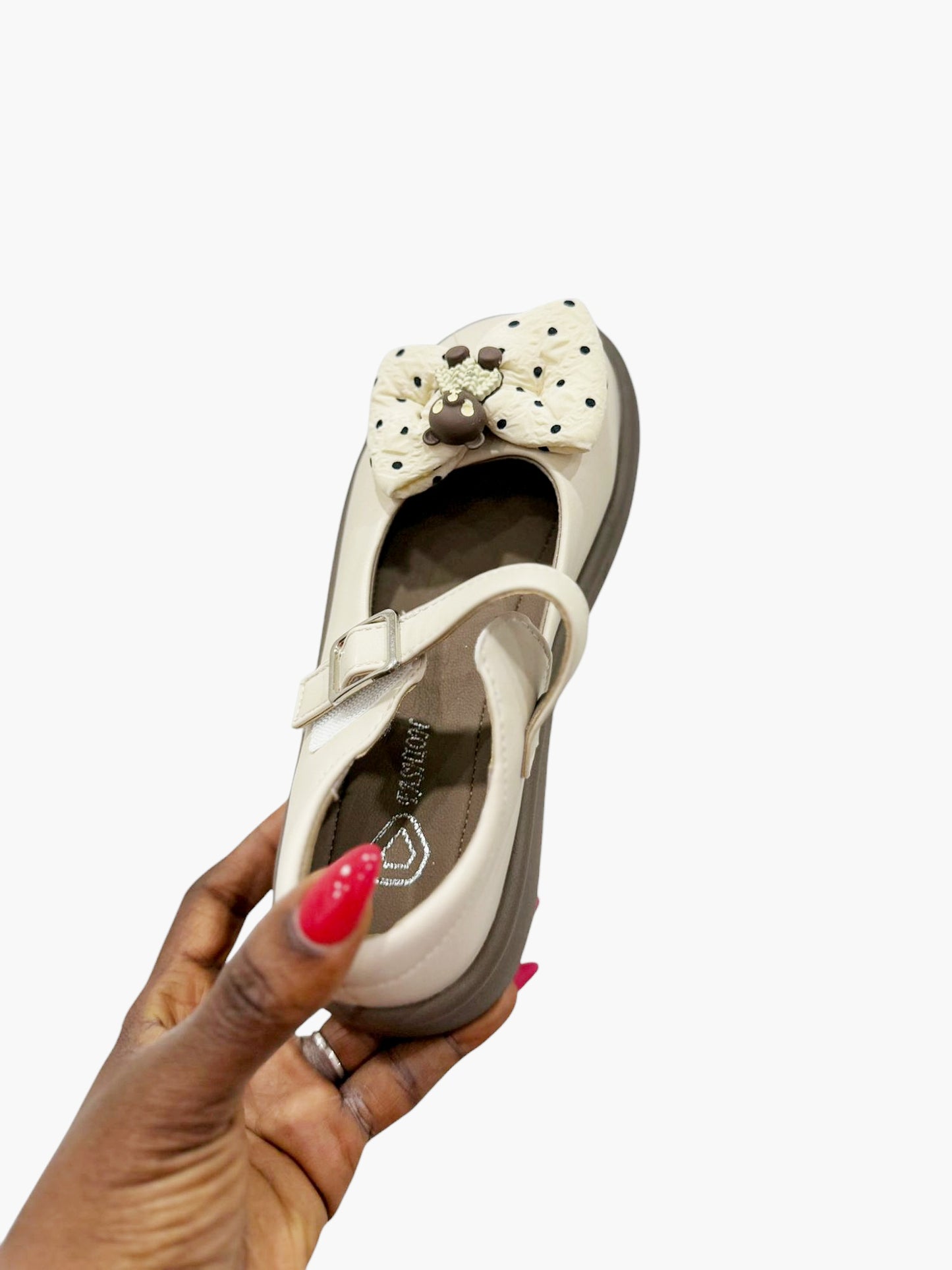 Black leather shoes with mickey bow