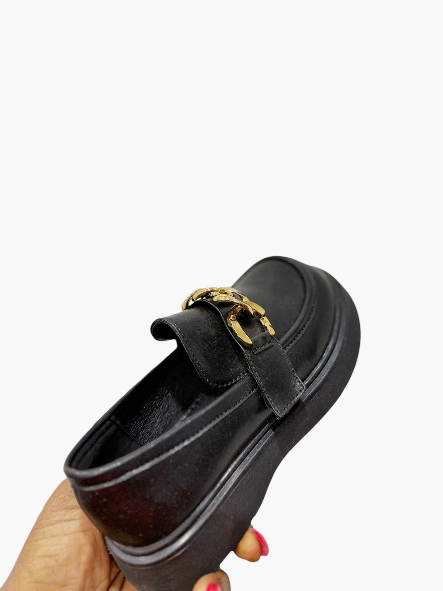 Black loafers with stunning gold buckle