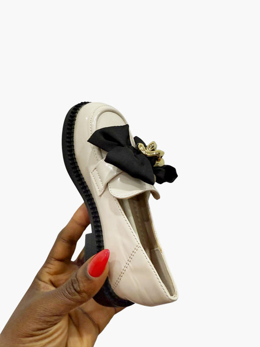 Girls' Cream Loafers with Black Bow & Gold Crown Accent