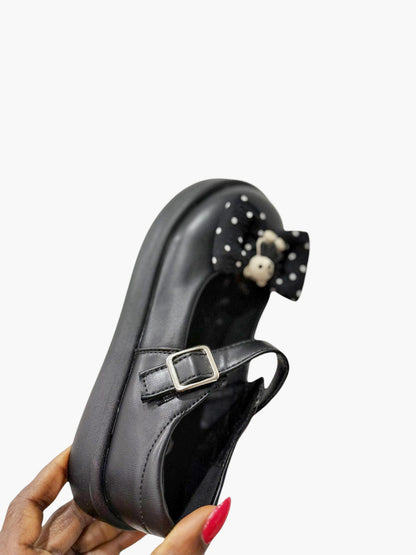 Black leather shoes with mickey bow