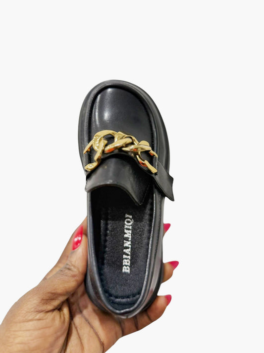 Black loafers with stunning gold buckle